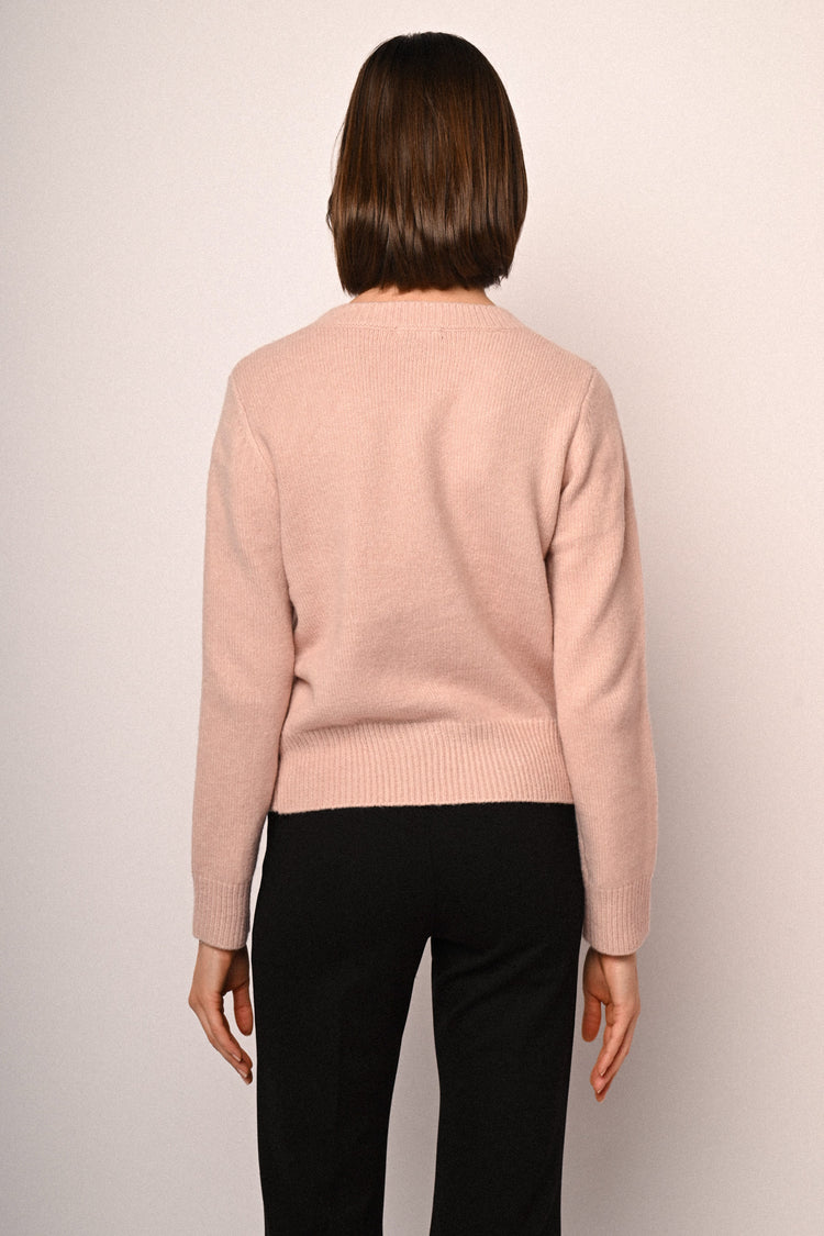 Pull con decorazione fiocchi