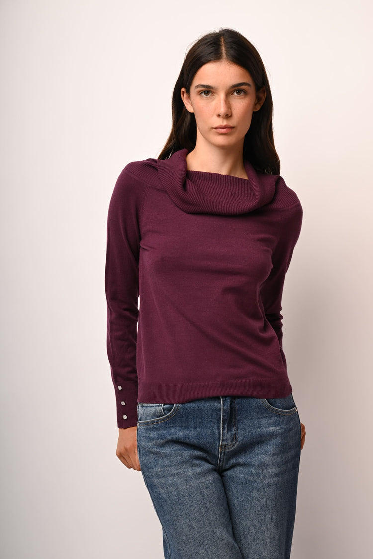 Pull con bottoni gioiello ai polsini
