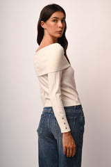 Pull con bottoni gioiello ai polsini