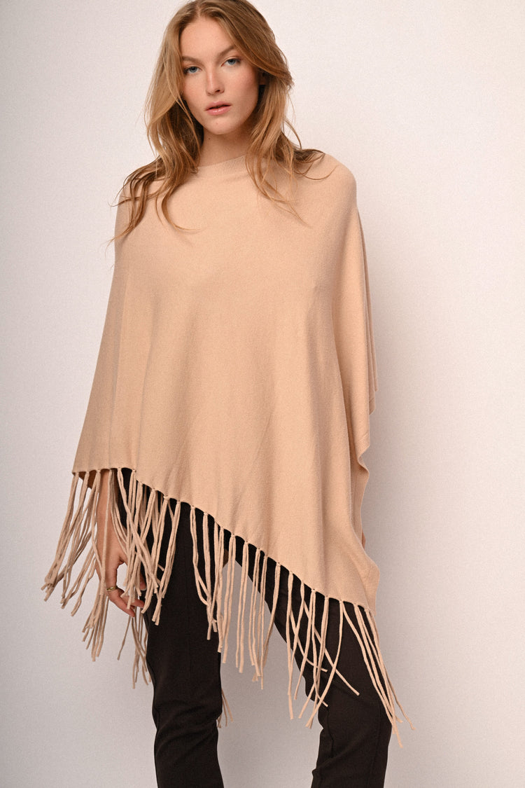 Poncho con frange
