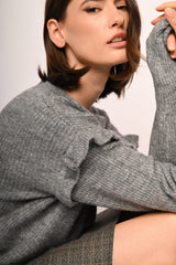 Pull con volants alle maniche