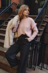 Pull con volants alle maniche