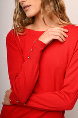 Pull con strass ai polsini