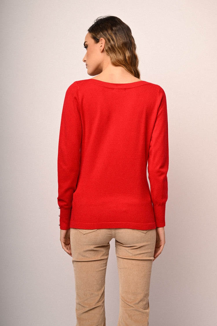 Pull con strass ai polsini