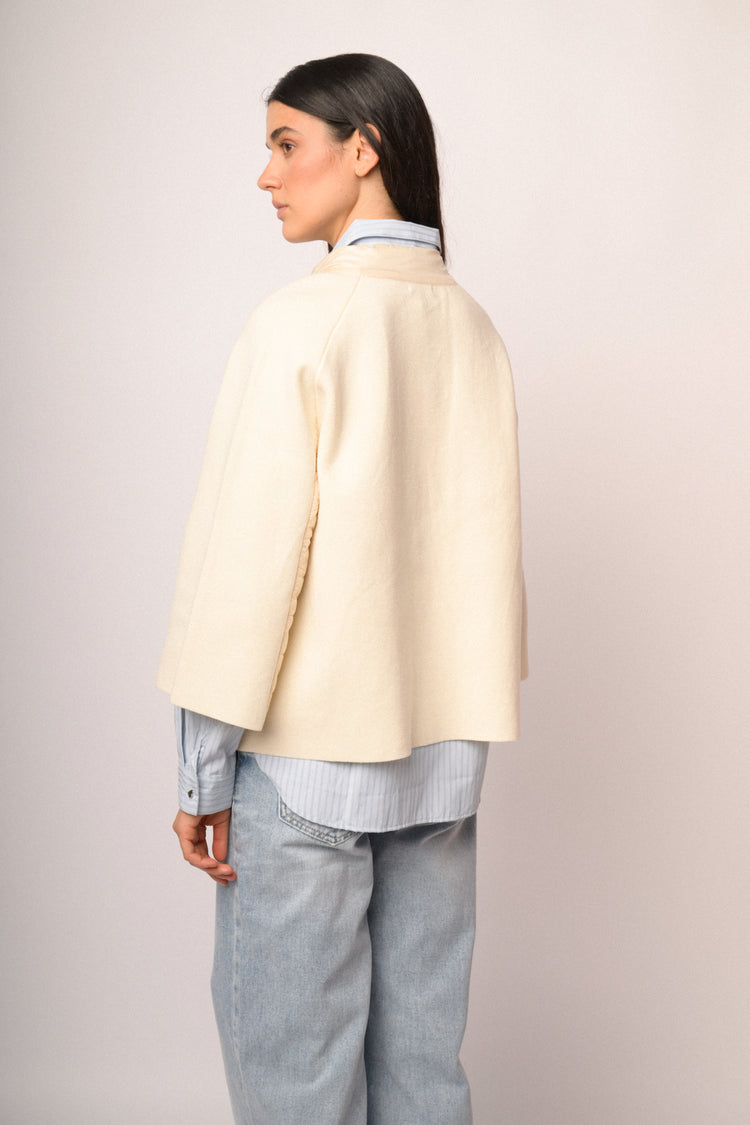 Giacca bimateriale in nylon e maglia avorio