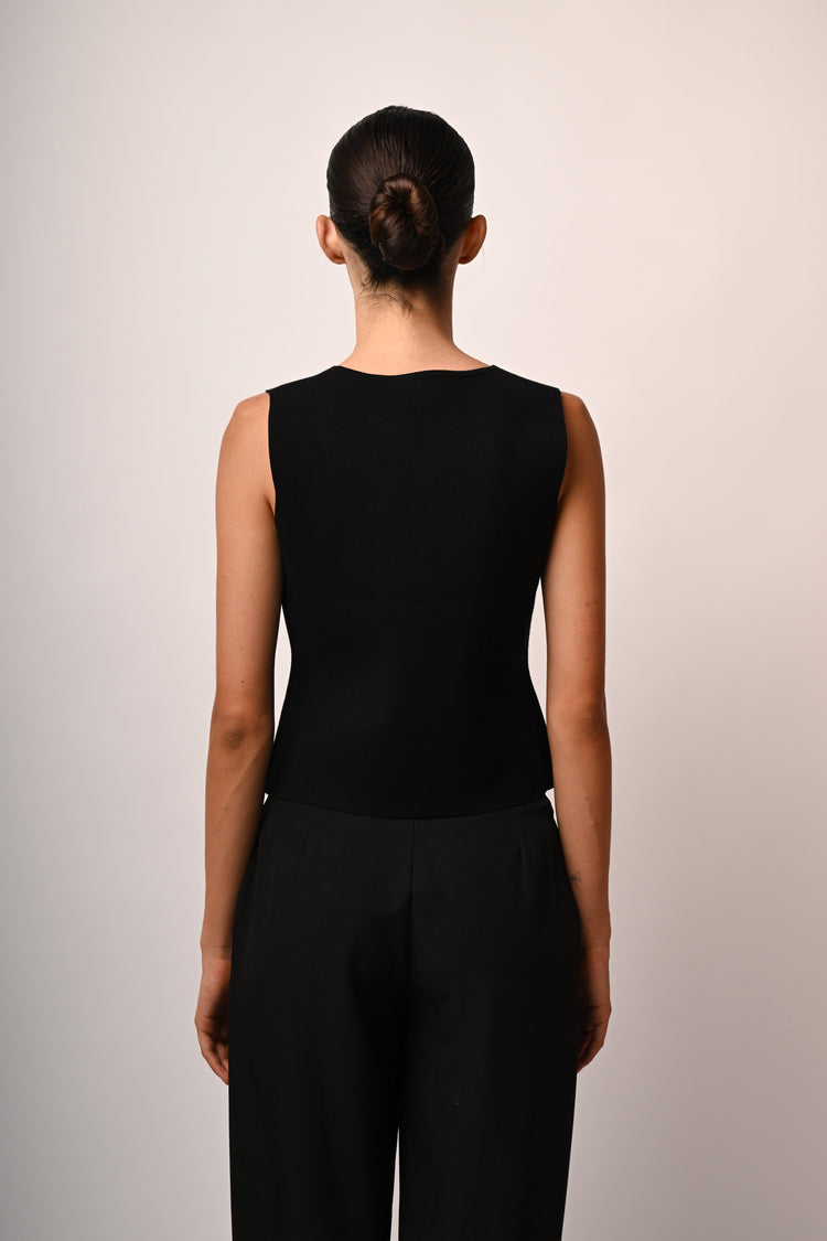 Gilet con tasche a filetto
