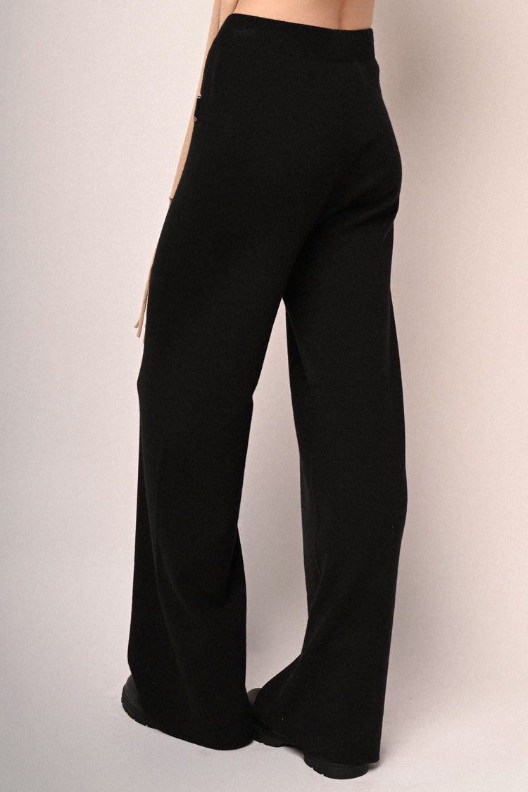 Pantaloni in maglia con bottoni e profili lurex