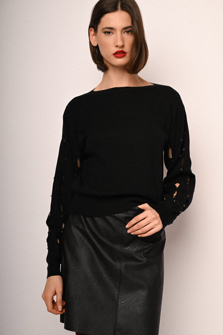 Pull con cut-outs e strass sulla maniche