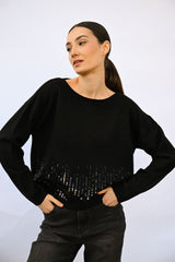 Pull boxy-fit con paillettes