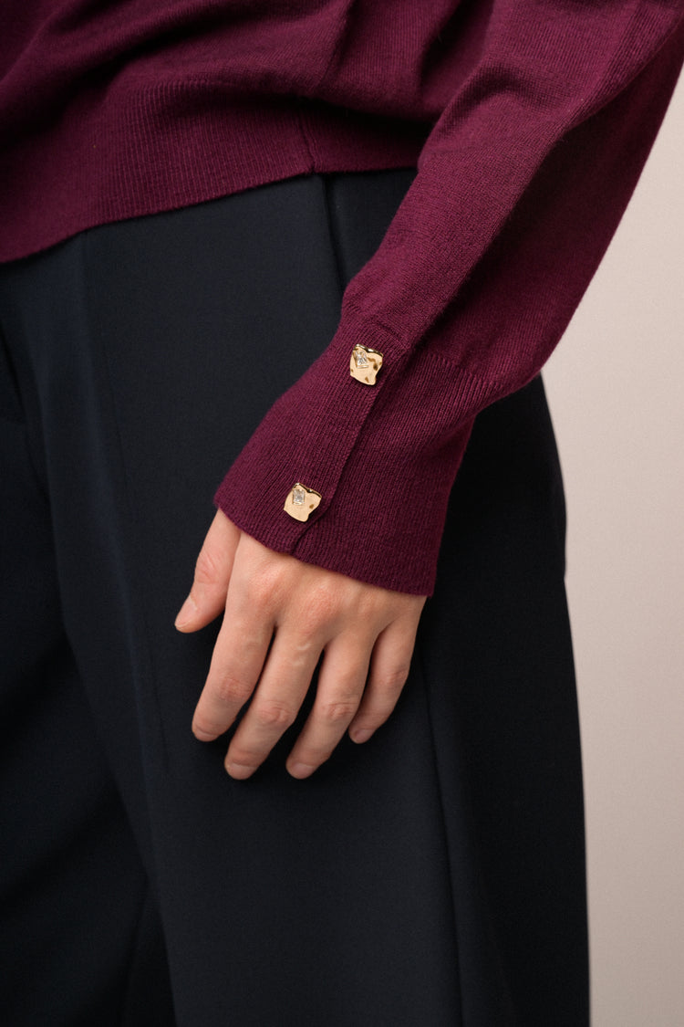 Maglia collone con bottoni