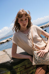 Top in maglia con laccetti