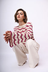Pull crochet a righe con maniche svasate