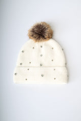 Berretto con pompon e strass