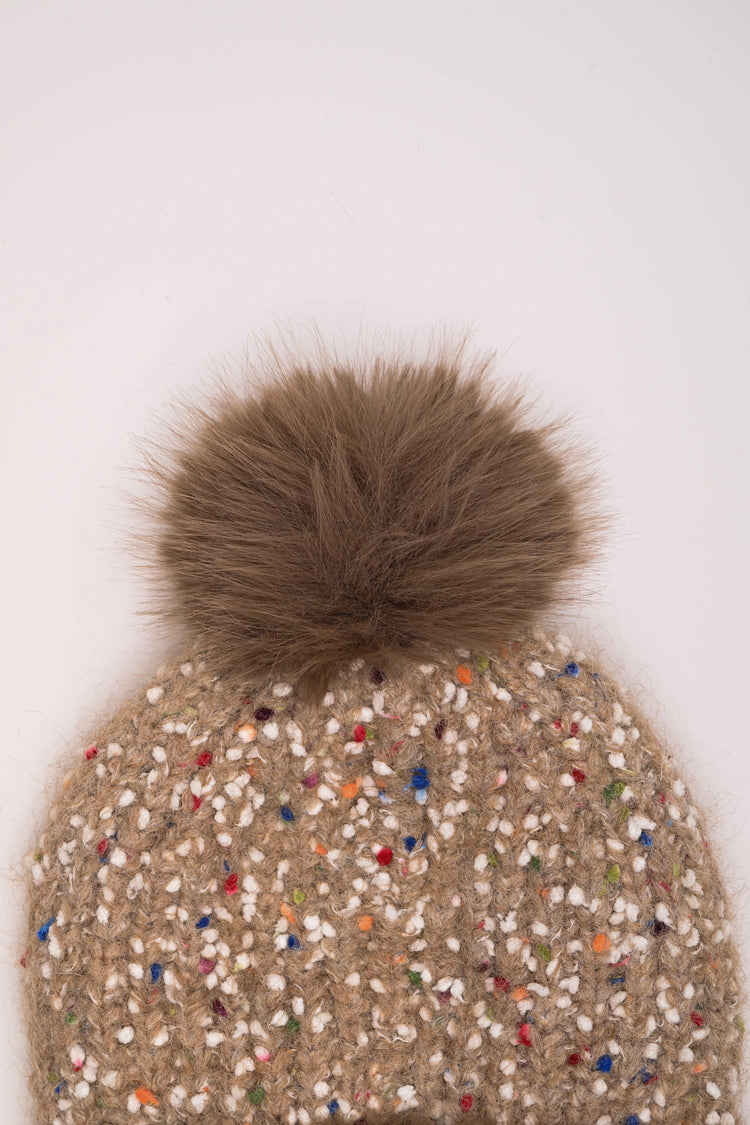 Berretto in maglia con pompon