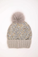 Berretto in maglia con pompon