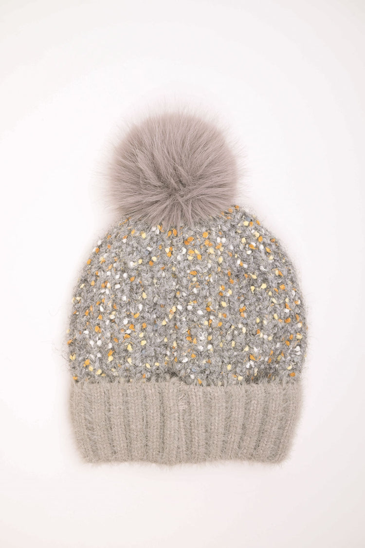 Berretto in maglia con pompon