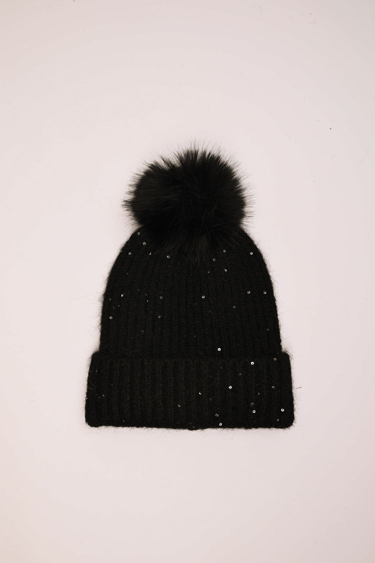 Berretto con pompon e paillettes