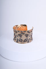 Bracciale rigido con strass animalier