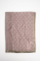 Stola con motivi geometrici rosa e banda dorata