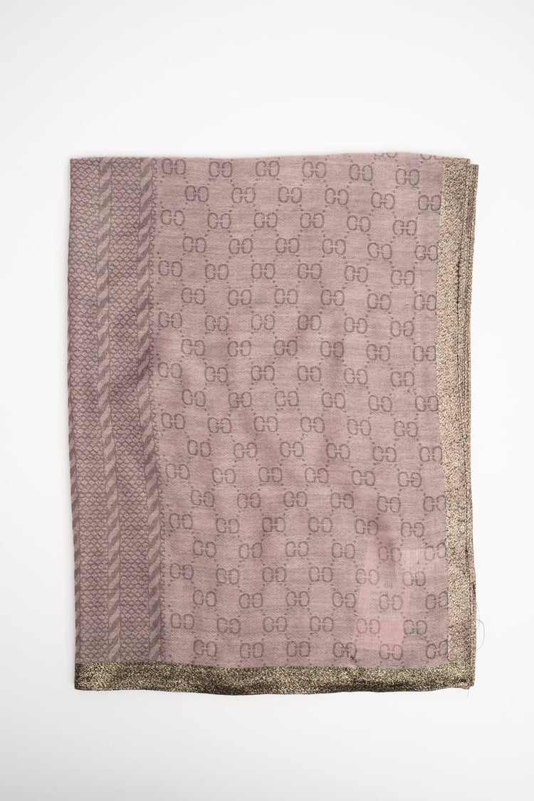 Stola con motivi geometrici rosa e banda dorata