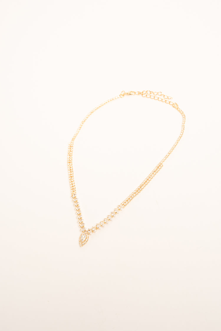 Collana in metallo dorato con strass