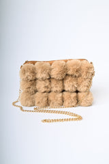 Borsa a pompon in faux fur
