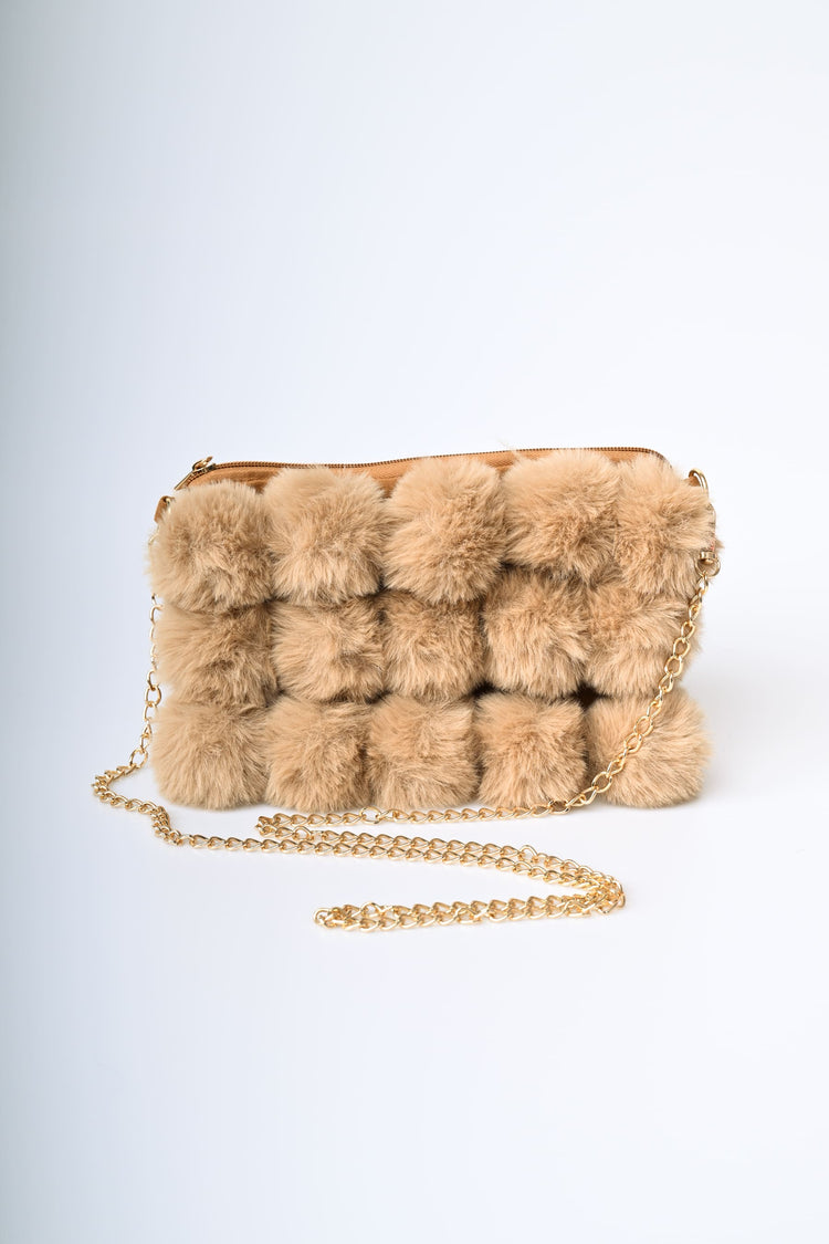 Borsa a pompon in faux fur
