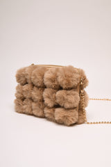 Borsa con pompon in faux fur