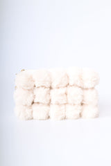 Borsa a pompon in faux fur