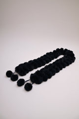 Collo con pompon in faux fur