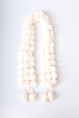 Sciarpa in faux fur a pompon