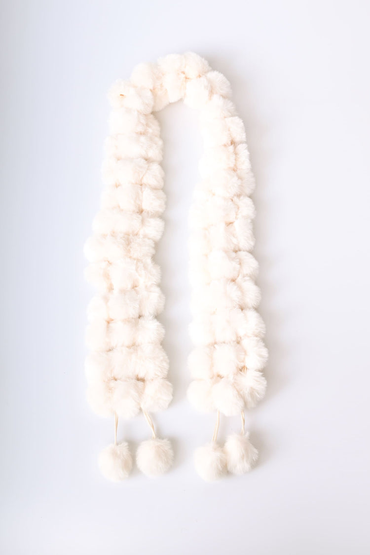Sciarpa in faux fur a pompon