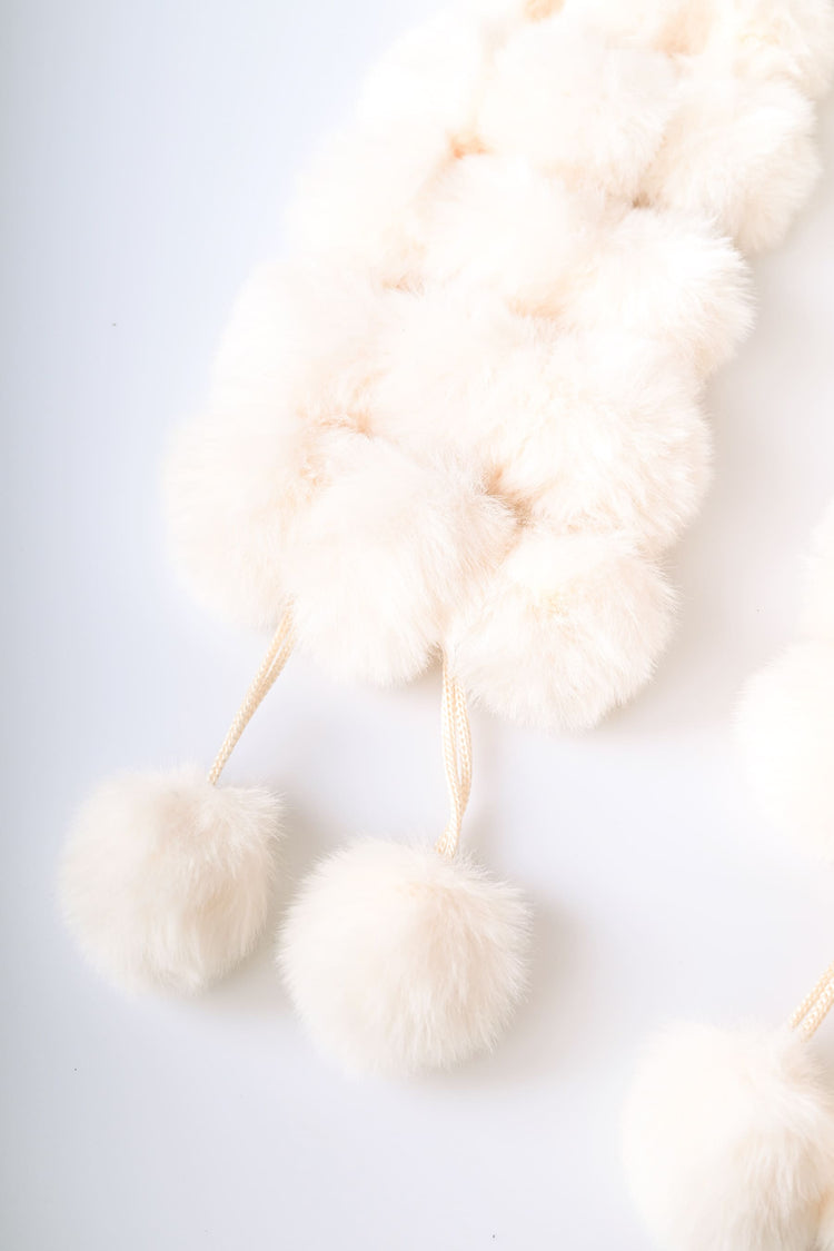 Sciarpa in faux fur a pompon