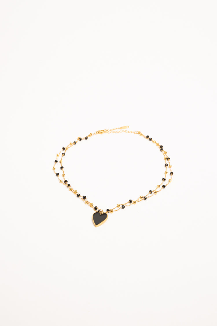 Collana a doppio filo con perline e pendente a cuore nero