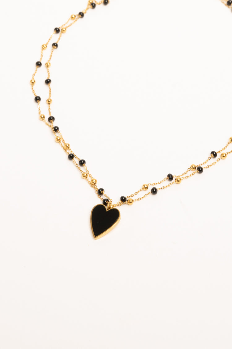 Collana a doppio filo con perline e pendente a cuore nero