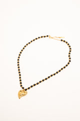 Collana con perline e pendente a cuore oro