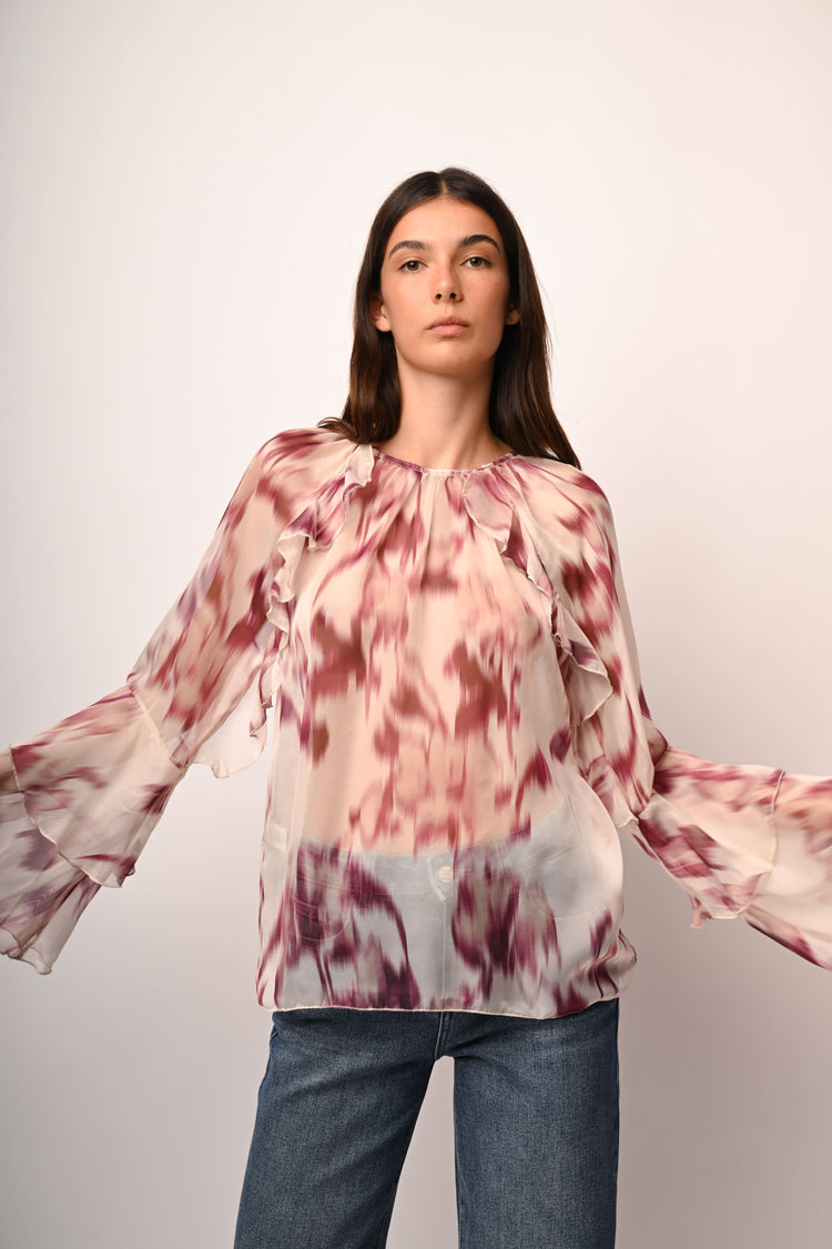 Blusa a stampa astratta con volants