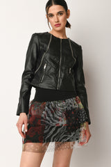 Giacca in similpelle con catenelle
