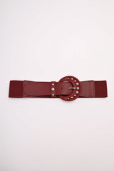 Cintura elastica con fibbia tonda e borchie
