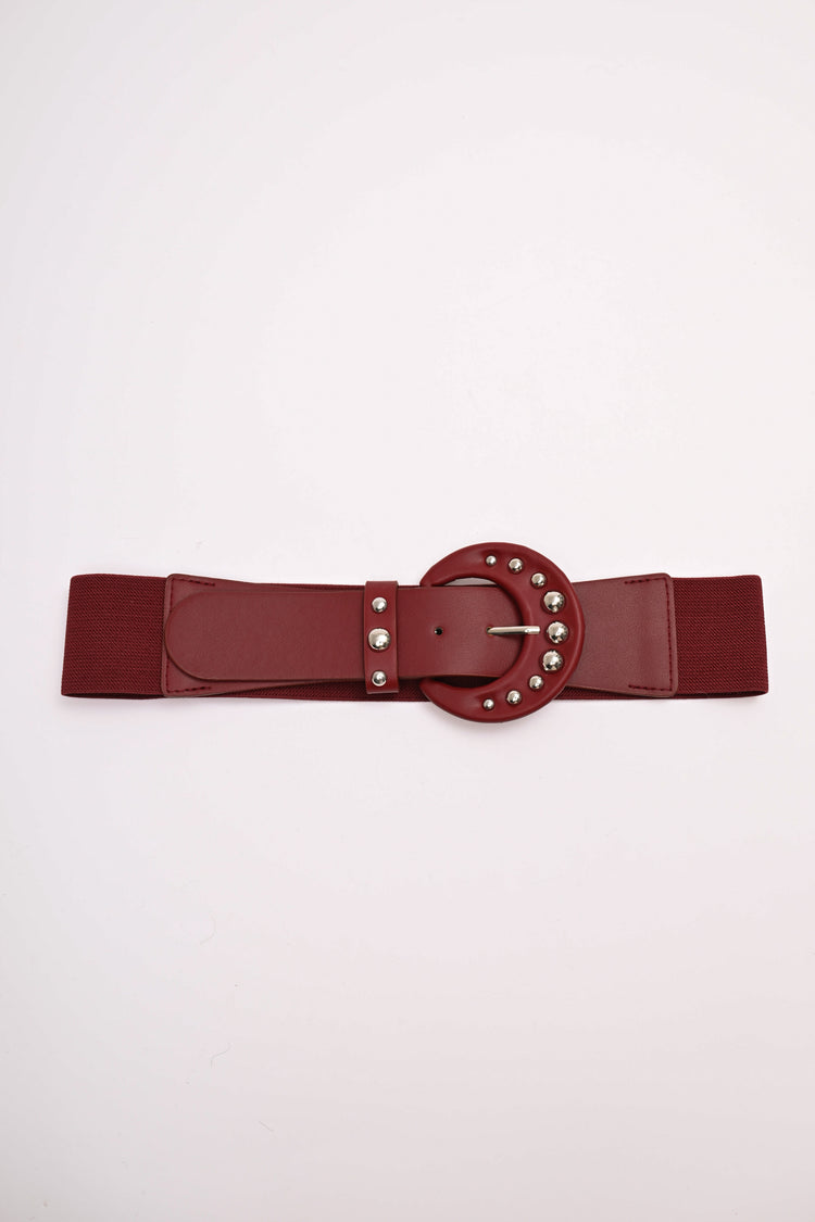 Cintura elastica con fibbia tonda e borchie