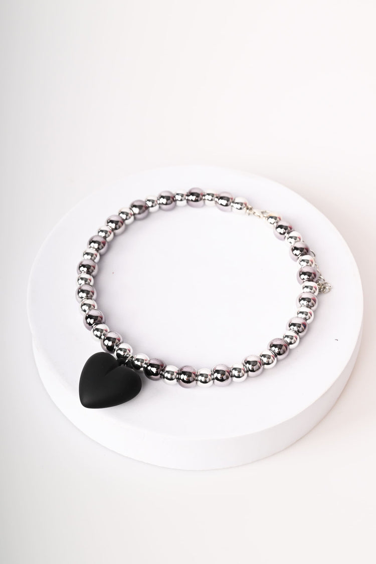 Collana con sfere e cuore
