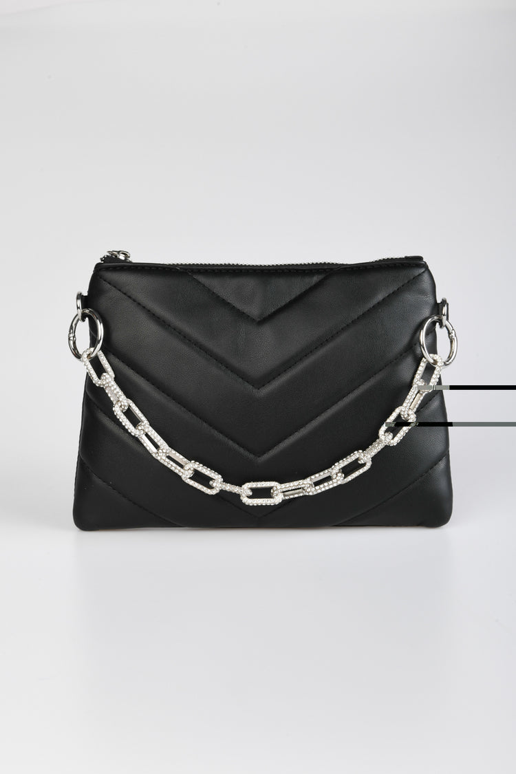 Clutch trapuntata con catena in strass