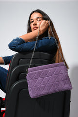 Pochette in faux suede trapuntato