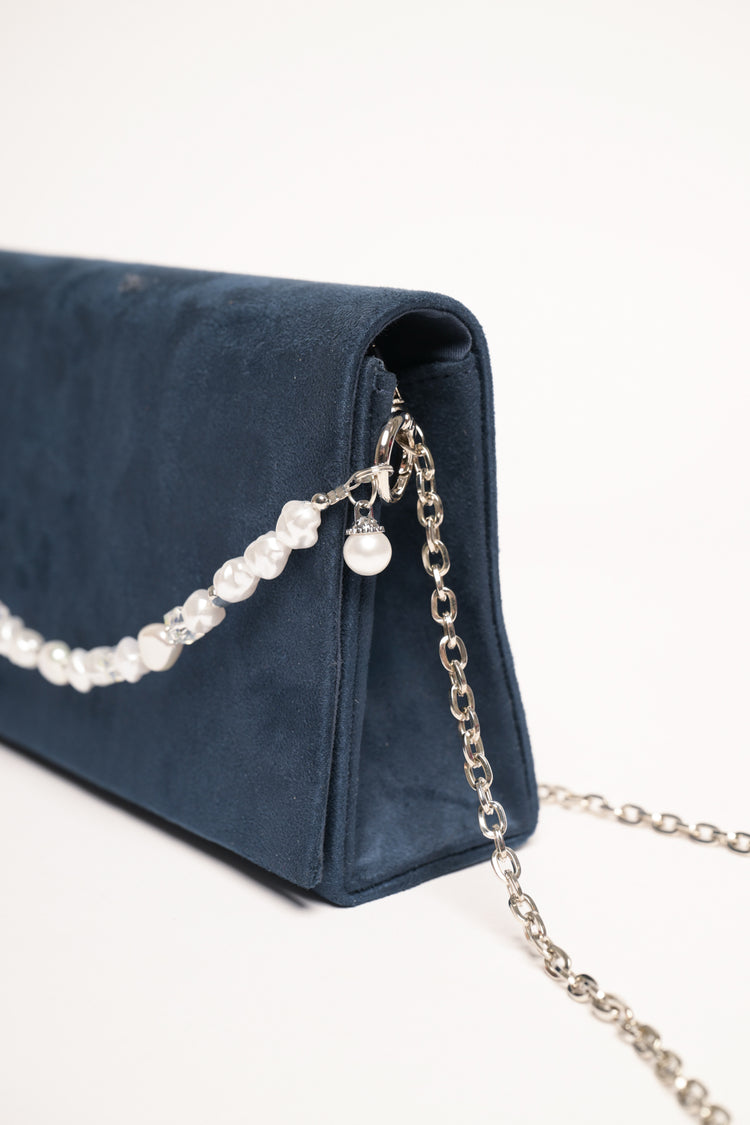 Pochette in faux suede con manico-gioiello