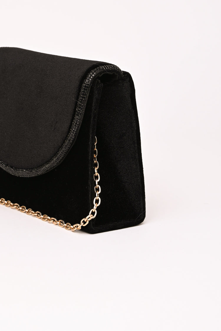 Pochette in velluto con profilo con strass