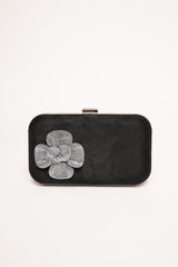 Clutch rigida in faux suede con fiore in strass