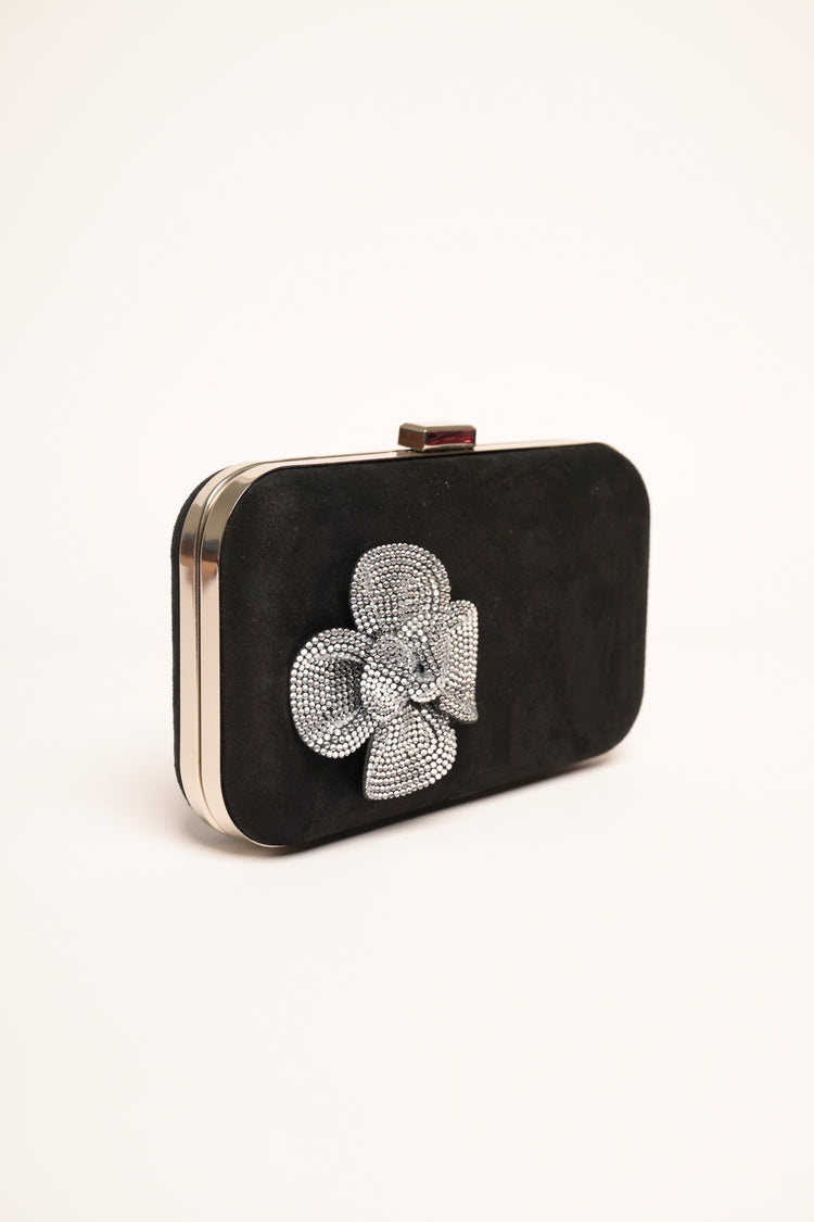Clutch rigida in faux suede con fiore in strass