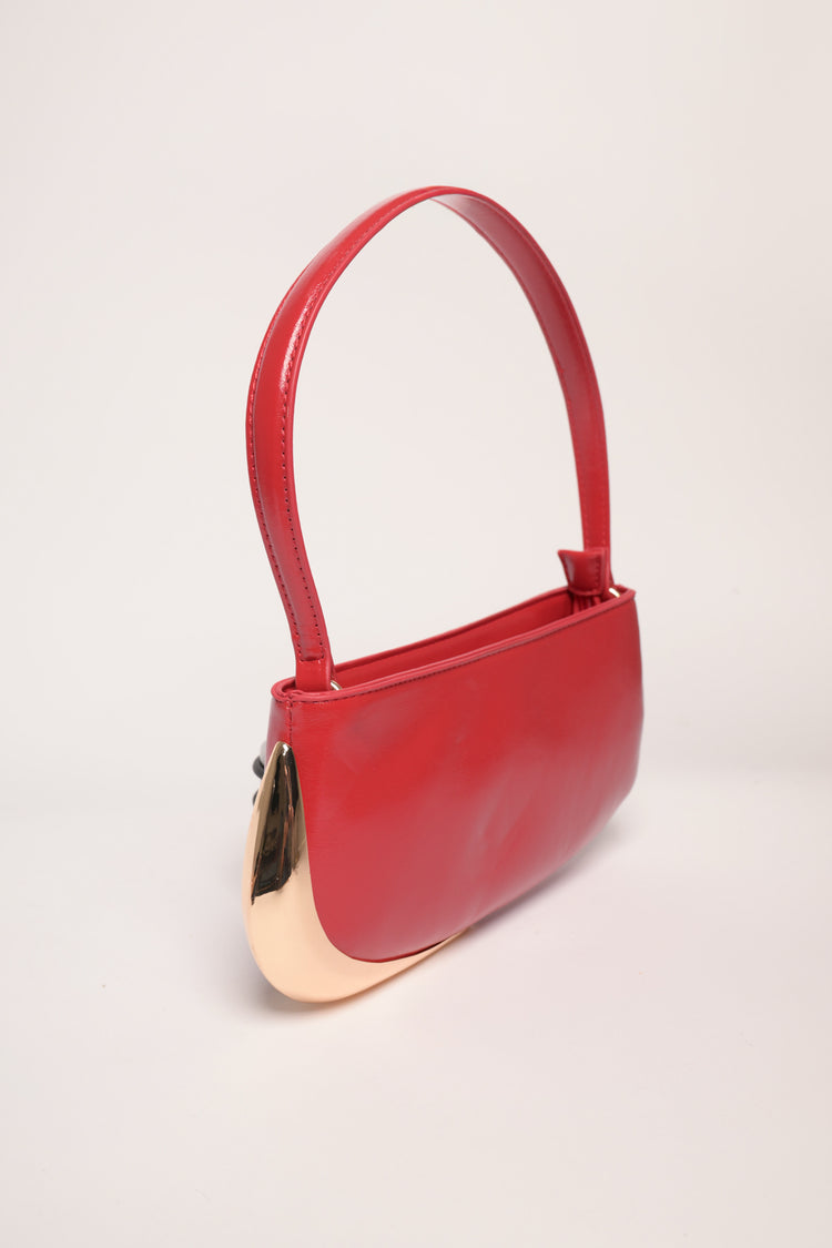 Borsa piccola rossa con placca dorata