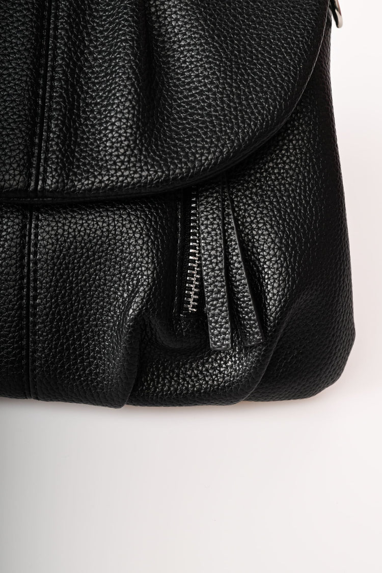 Borsa in similpelle martellata