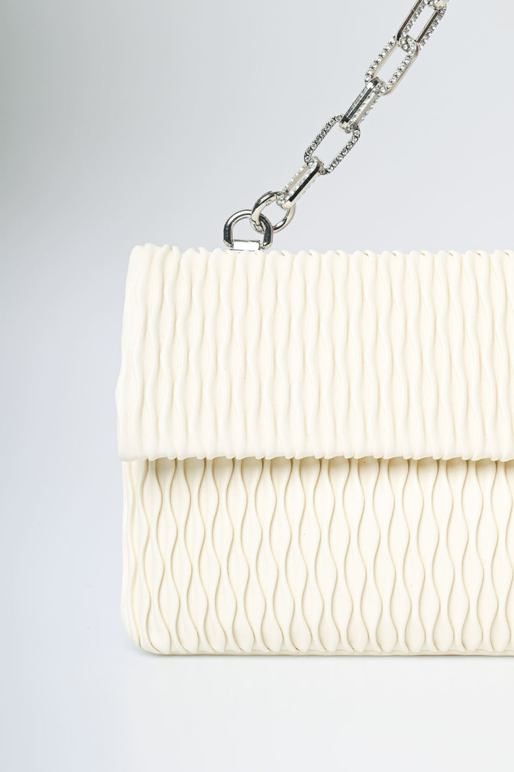 Pochette goffrata con manico gioiello